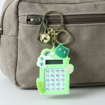 Digital calculator keychain featuring frog cartoon design and key ring
