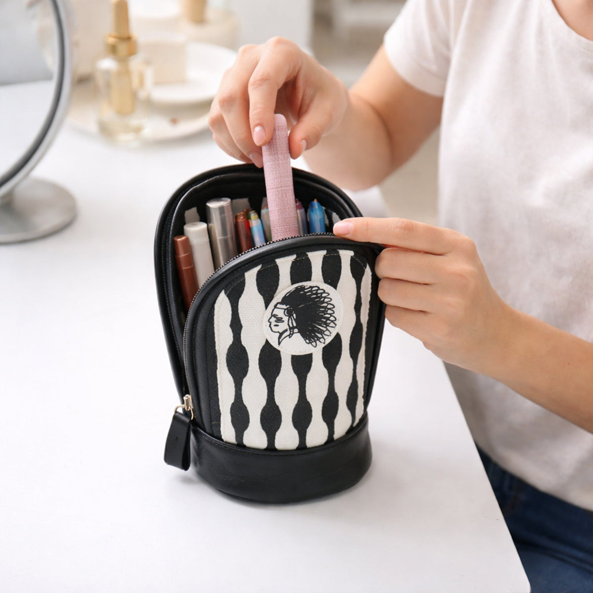 Stationery organizer with pens and pencils inside the durable zipper pouch