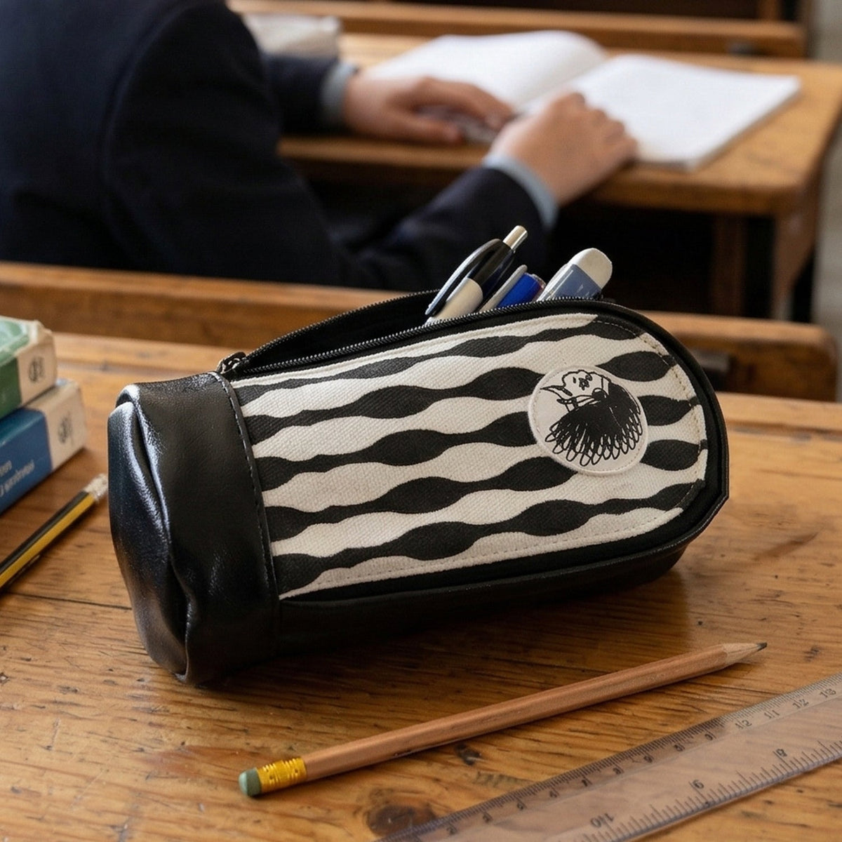 Zipper closure pencil pouch with hard base for stability