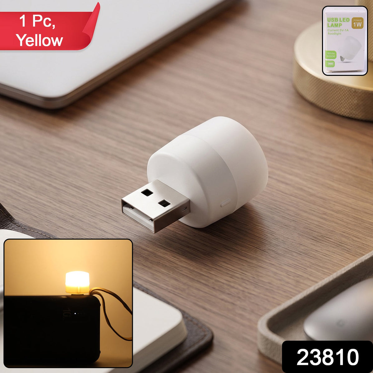 Compact yellow USB LED lamp with packaging showing product branding